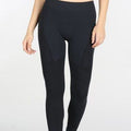 A pair of dark navy Nikibiki moto lined women's leggings with a bold patterned design.